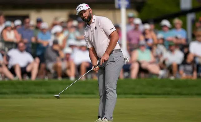 Jon Rahm, of Spain, putts on the 18th green during the third round of the PGA Championship golf tournament at Aronimink Golf Club, Saturday, May 16, 2026, in Newtown Square, PA. (AP Photo/Frank Franklin II)