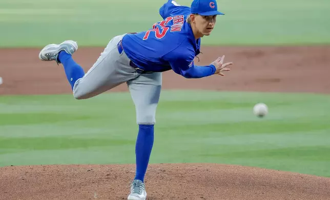 Chicago Cubs pitcher Ben Brown delivers to an Atlanta Braves batter during the first inning of a baseball game, Thursday, May 14, 2026, in Atlanta. (AP Photo/Erik S. Lesser)