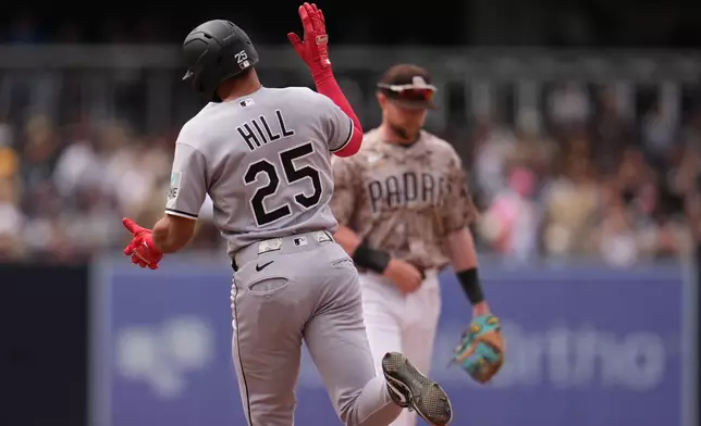 Chicago White Sox's Derek Hill (25) celebrates his two-run home run during the seventh inning of a baseball game against the San Diego Padres Sunday, May 3, 2026, in San Diego. (AP Photo/Gregory Bull)