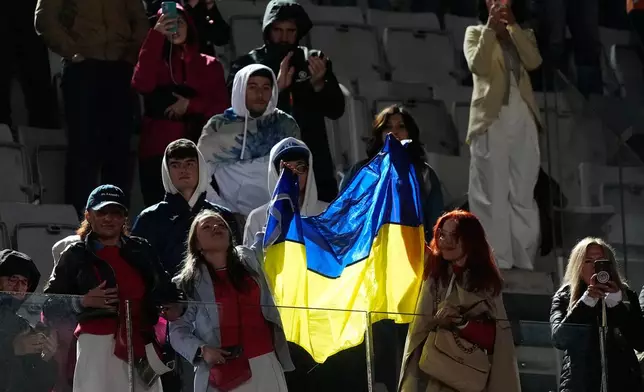 Fans show Ukraine's flag during the final match between Ukraine's Elina Svitolina and United States' Coco Gauff at the Italian Open tennis tournament in Rome, Saturday, May 16, 2026. (AP Photo/Alessandra Tarantino)