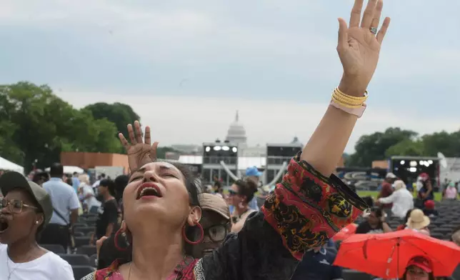 Guest attend the Rededicate 250: A National Jubilee Of Prayer, Praise &amp; Thanksgiving, Sunday, May 17, 2026, in Washington. (AP Photo/Rod Lamkey, Jr.)