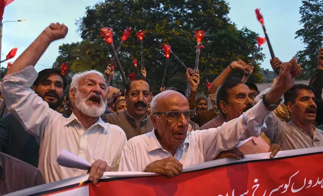 Members of trade unions take part in a rally a day ahead of the International Labor Day, in Karachi, Pakistan, Thursday, April 30, 2026. (AP Photo/Ali Raza)