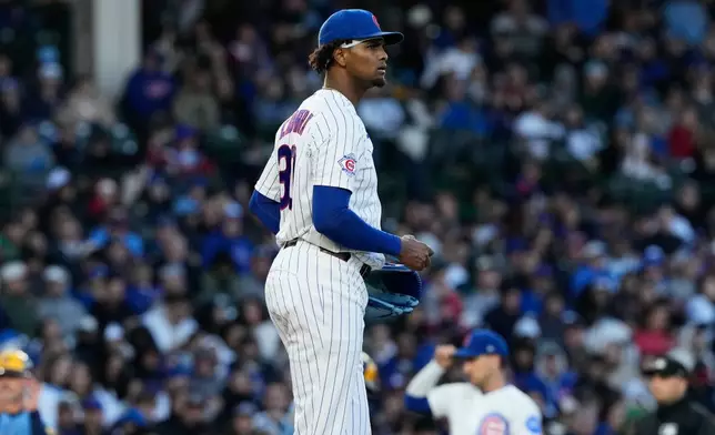 Chicago Cubs starting pitcher Edward Cabrera looks to the scoreboard during the third inning of a baseball game against the Milwaukee Brewers in Chicago, Wednesday, May 20, 2026. (AP Photo/Nam Y. Huh)