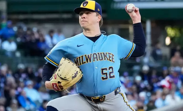 Milwaukee Brewers starting pitcher Kyle Harrison throws against the Chicago Cubs during the first inning of a baseball game in Chicago, Wednesday, May 20, 2026. (AP Photo/Nam Y. Huh)