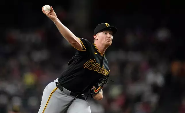 Pittsburgh Pirates starting pitcher Mitch Keller throws against the Arizona Diamondbacks during the first inning of a baseball game, Thursday, May 7, 2026, in Phoenix. (AP Photo/Ross D. Franklin)