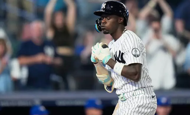 New York Yankees' Jazz Chisholm Jr. reacts after hitting a two-run home run during the seventh inning of a baseball game against the Toronto Blue Jays, Monday, May 18, 2026, in New York. (AP Photo/Seth Wenig)