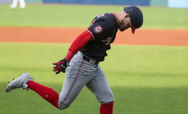 Washington Nationals' Curtis Mead rounds the bases after hitting a two-run home run off Cleveland Guardians starting pitcher Tanner Bibee during the first inning of a baseball game, Monday, May 25, 2026, in Cleveland. (AP Photo/Phil Long)