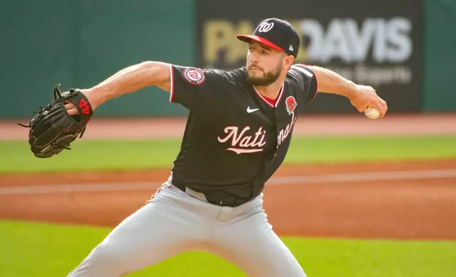 Washington Nationals starting pitcher PJ Poulin delivers against the Cleveland Guardians during the first inning of a baseball game, Monday, May 25, 2026, in Cleveland. (AP Photo/Phil Long)