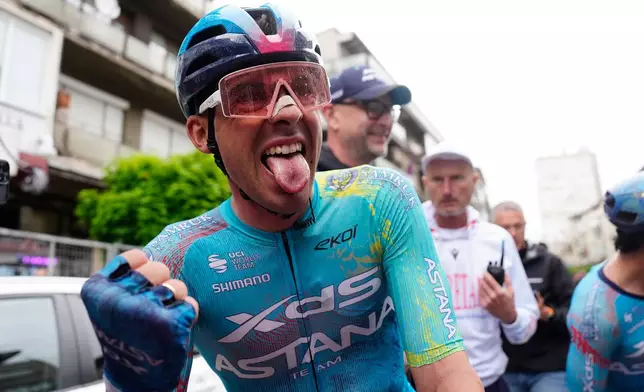 Uruguay's Guillermo Thomas Silva Coussan celebrates after winning the second stage of the Giro d'Italia cycling race, from Burgas to Veliko Tarnovo, Bulgaria, Saturday, May 9, 2026. (Fabio Ferrari/LaPresse via AP)