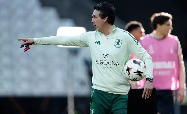 Aston Villa's head coach Unai Emery instructs his players during a training session ahead of the Europa League final soccer match between Freiburg and Aston Villa in Istanbul, Turkey, Tuesday, May 19, 2026. (AP Photo/Emrah Gurel)