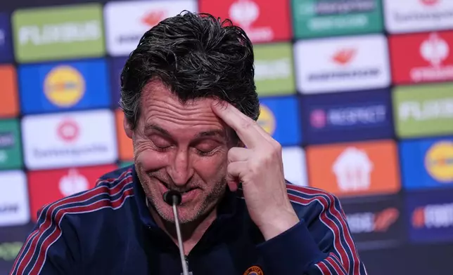 Aston Villa's head coach Unai Emery looks down during a press conference ahead of the Europa League final soccer match between Freiburg and Aston Villa in Istanbul, Turkey, Tuesday, May 19, 2026. (AP Photo/Francisco Seco, Pool)