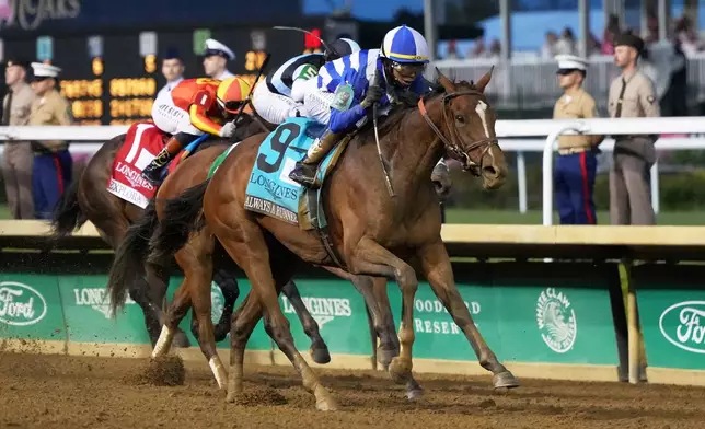 Always a Runner (9) ridden by Jose L. Ortiz wins the 152nd running of the Kentucky Oaks horse race at Churchill Downs, Friday, May 1, 2026, in Louisville, Ky. (AP Photo/Jeff Roberson)