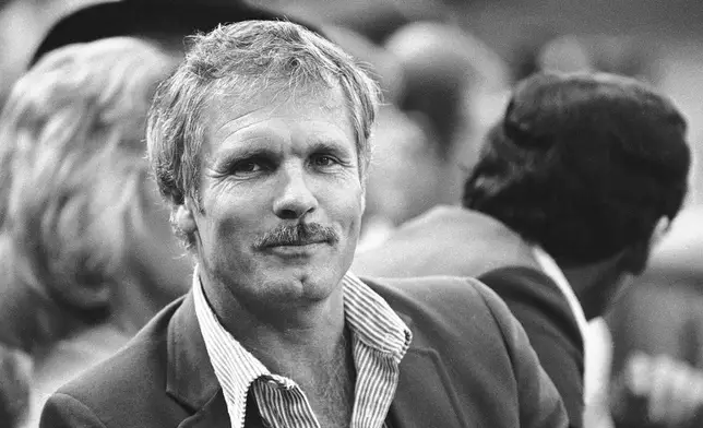FILE - Atlanta Braves owner Ted Turner watches his team in action against the St. Louis Cardinals during the first National League Championship game, Oct. 6, 1982, St. Louis. (AP Photo/Rusty Kennedy, File)