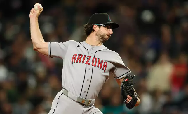 Arizona Diamondbacks pitcher Zac Gallen throws against the Seattle Mariners during the first inning of a baseball game Friday, May 29, 2026, in Seattle. (AP Photo/Caean Couto)