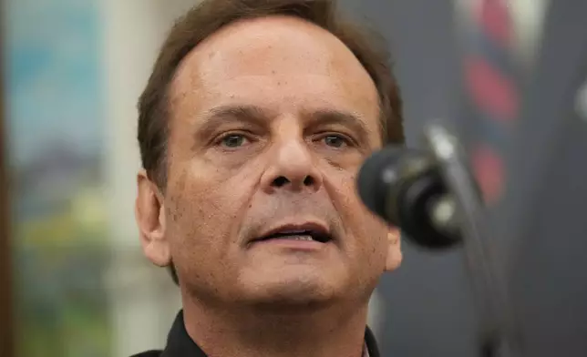 Kevin McDaniel, Piggly Wiggly franchise owner, speaks during an event with President Donald Trump about loosening a federal refrigerant rule, in the Oval Office at the White House, Thursday, May 21, 2026, in Washington. (AP Photo/Jacquelyn Martin)