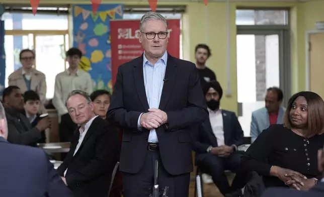 Britain's Prime Minister Sir Keir Starmer speaks to Labour Party members at Kingsdown Methodist Church Hall, in Ealing, west London, Friday May 8, 2026, a day after the local elections. (Stefan Rousseau/PA via AP)