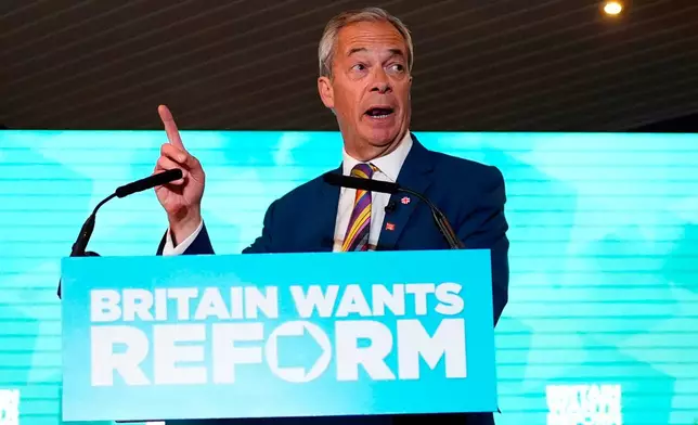 Reform UK leader Nigel Farage speaks to supporters at Chelmsford City Racecourse, Friday May 8, 2026, in Essex, England, following the 2026 local election results. (Jordan Pettitt/PA via AP)