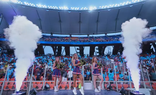 Cheer leaders dance before the Indian Premier League cricket match between Gujarat Titans and Punjab Kings in Ahmedabad, India, Sunday, May 3, 2026. (AP Photo/Ajit Solanki)