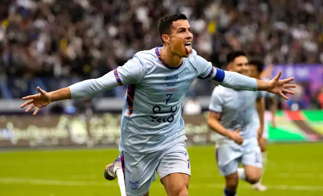 FILE - Al Nassr's Cristiano Ronaldo celebrates after scoring at the King Saud University Stadium, in Riyadh, Saudi Arabia, Jan. 19, 2023. (AP Photo/Hussein Malla, file)