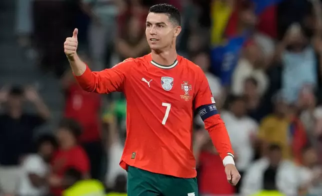 FILE - Portugal's Cristiano Ronaldo celebrates after scoring during a World Cup 2026 group F qualifying soccer match between Portugal and Hungary in Lisbon, Oct. 14, 2025. (AP Photo/Armando Franca, File)