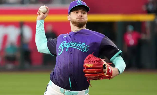 Arizona Diamondbacks pitcher Ryne Nelson throws against the New York Mets in the first inning of a baseball game, Friday, May 8, 2026, in Phoenix. (AP Photo/Rick Scuteri)
