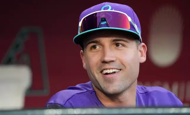 Arizona Diamondbacks' Ryan Waldschmidt gets ready before a baseball game against the New York Mets, Friday, May 8, 2026, in Phoenix. (AP Photo/Rick Scuteri)