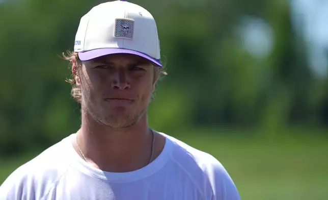 Minnesota Vikings quarterback J.J. McCarthy talks to reporters after an NFL football practice Wednesday, May 27, 2026, in Eagan, Minn. (AP Photo/Abbie Parr)
