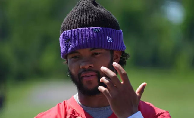 Minnesota Vikings quarterback Kyler Murray talks to reporters after an NFL football practice Wednesday, May 27, 2026, in Eagan, Minn. (AP Photo/Abbie Parr)
