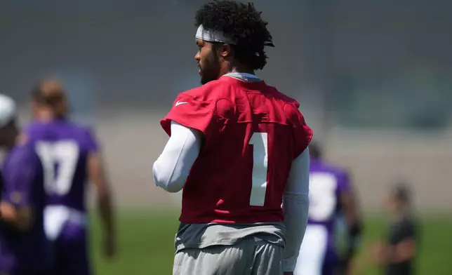 Minnesota Vikings quarterback Kyler Murray (1) stands on the field during an NFL football practice Wednesday, May 27, 2026, in Eagan, Minn. (AP Photo/Abbie Parr)
