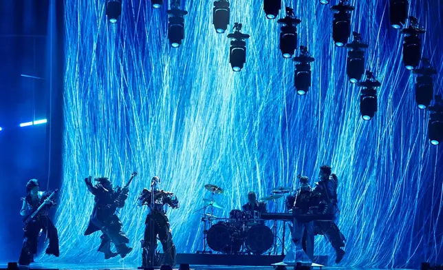 Lavina from Serbia performs the song "Kraj Mene" during the Grand Final of the 70th Eurovision Song Contest in Vienna, Austria, Saturday, May 16, 2026. (AP Photo/Martin Meissner)