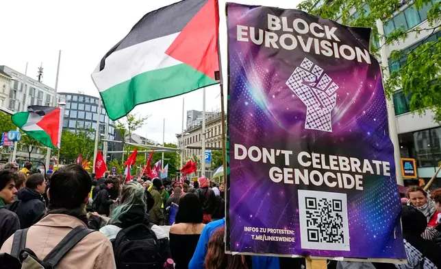 Demonstrators protest against Israel ahead of the Grand Final of the 70th Eurovision Song Contest in Vienna, Austria, Saturday, May 16, 2026. (AP Photo/Martin Meissner)