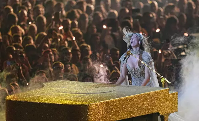 Delta Goodrem from Australia performs the song "Eclipse" during the dress rehearsal for the Grand Final of the 70th Eurovision Song Contest in Vienna, Austria, Friday, May 15, 2026. (AP Photo/Martin Meissner)