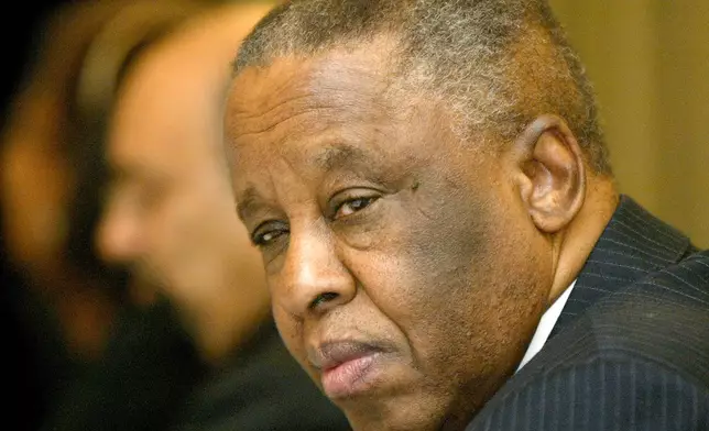 FILE - President of the Republic of Botswana Festus Mogae looks on at an interactive meeting of a high level delegation from Botswana and members of the Indian Merchants' Chamber, one of India's leading trade bodies, in Mumbai, India, Dec. 12, 2006. (AP Photo/Gautam Singh, File)
