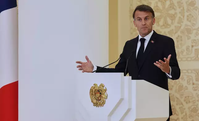 French President Emmanuel Macron addresses a media conference during the EU-Armenia summit at the Presidential Palace in Yerevan, Armenia, Tuesday, May 5, 2026. (AP Photo/Anthony Pizzoferrato)