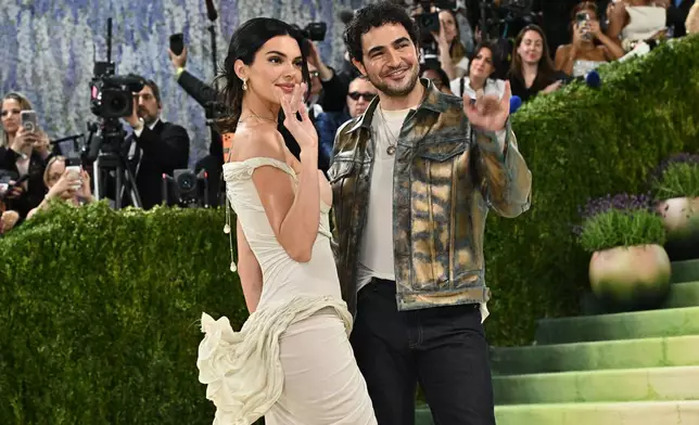 Kendall Jenner, left, and Zac Posen arrive at The Metropolitan Museum of Art's Costume Institute benefit gala celebrating the opening of the "Costume Art" exhibition on Monday, May 4, 2026, in New York. (Photo by Evan Agostini/Invision/AP)
