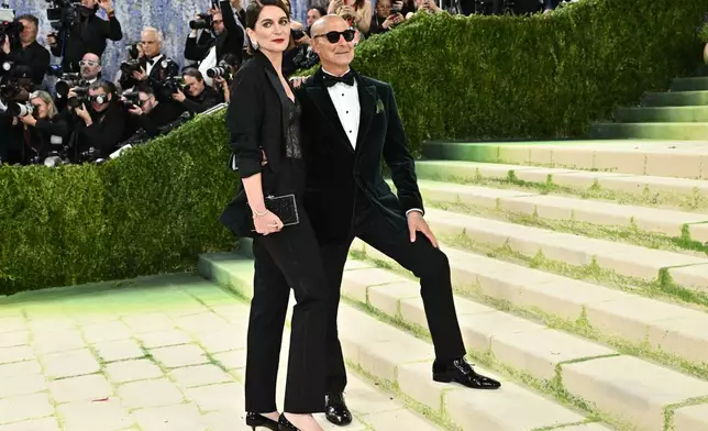 Felicity Blunt, left, and Stanley Tucci arrive at The Metropolitan Museum of Art's Costume Institute benefit gala celebrating the opening of the "Costume Art" exhibition on Monday, May 4, 2026, in New York. (Photo by Evan Agostini/Invision/AP)