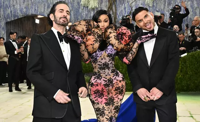 Marc Jacobs, from left, Cardi B and Char Defrancesco arrive at The Metropolitan Museum of Art's Costume Institute benefit gala celebrating the opening of the "Costume Art" exhibition on Monday, May 4, 2026, in New York. (Photo by Evan Agostini/Invision/AP)