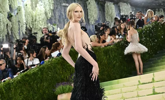 Alex Consani arrives at The Metropolitan Museum of Art's Costume Institute benefit gala celebrating the opening of the "Costume Art" exhibition on Monday, May 4, 2026, in New York. (Photo by Evan Agostini/Invision/AP)