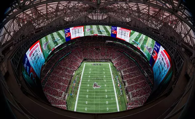 FILE - A general view of Mercedes-Benz Stadium during the first half of an NFL football game between the Atlanta Falcons and the Miami Dolphins, Sunday, Oct. 26, 2025, in Atlanta. (AP Photo/Danny Karnik,File)