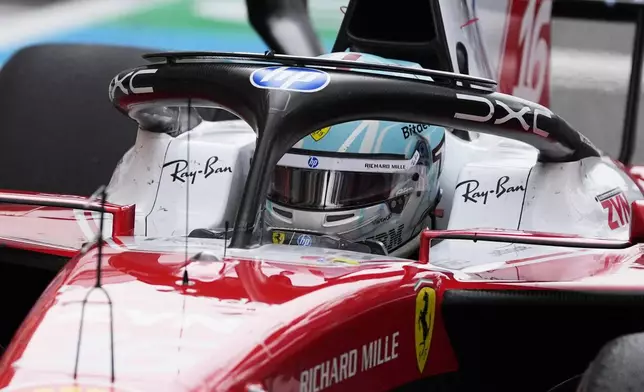 Ferrari driver Charles Leclerc of Monaco enters the pit area during the Miami Formula One Grand Prix auto race, Sunday, May 3, 2026, in Miami Gardens, Fla. (AP Photo/Rebecca Blackwell, Pool)