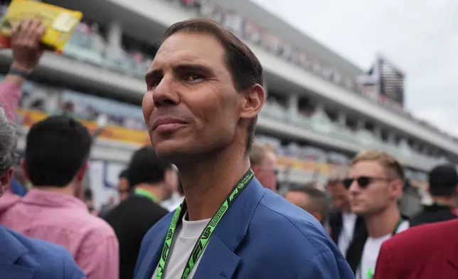 Rafael Nadal stands in the paddock before the Miami Formula One Grand Prix auto race, Sunday, May 3, 2026, in Miami Gardens, Fla. (AP Photo/Rebecca Blackwell)