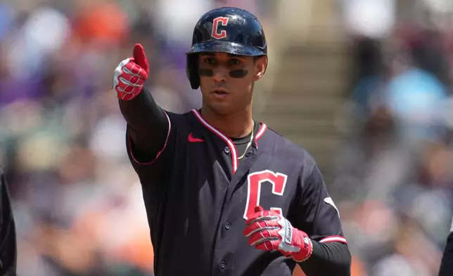 Cleveland Guardians' Brayan Rocchio reacts to his double against the Detroit Tigers during the third inning of a baseball game Thursday, May 21, 2026, in Detroit. (AP Photo/Paul Sancya)