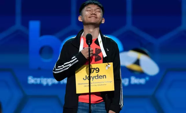 Jayden Le, 13, of Oklahoma City, Okla., reacts after spelling his word correct during the preliminary round of the Scripps National Spelling Bee at DAR Constitution Hall, Tuesday, May 26, 2026, in Washington. (AP Photo/Jose Luis Magana)