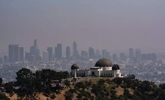 The Griffith Observatory is seen against the backdrop of a hazy Los Angeles skyline, May 8, 2026. (AP Photo/Jae C. Hong)