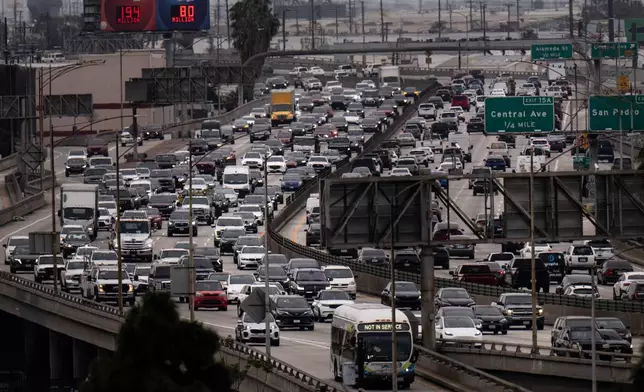 FILE - Traffic moves along the Interstate 10 freeway in Los Angeles, March 31, 2026. (AP Photo/Jae C. Hong, File)
