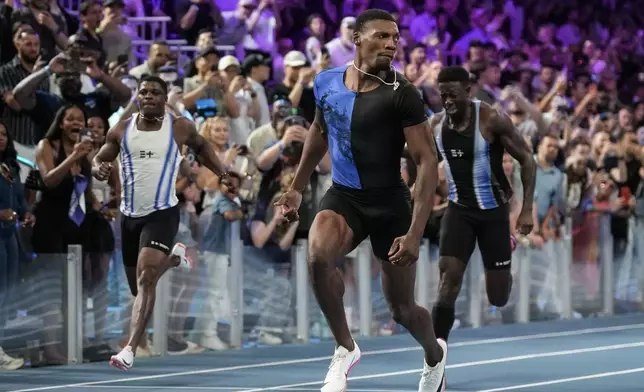 Fred Kerley, of the United States, wins the men's 100-meter final at the Enhanced Games in Las Vegas, Sunday, May 24, 2026. (AP Photo/Jae C. Hong)