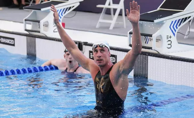 Kristian Gkolomeev, of Greece, celebrates after winning the men's 100-meter freestyle final at the Enhanced Games in Las Vegas, Sunday, May 24, 2026. (AP Photo/Jae C. Hong)