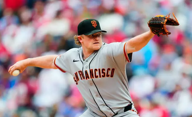 San Francisco Giants pitcher Logan Webb throws during the third inning in the first baseball game of a doubleheader against the Philadelphia Phillies, Thursday, April 30, 2026, in Philadelphia. (AP Photo/Derik Hamilton)