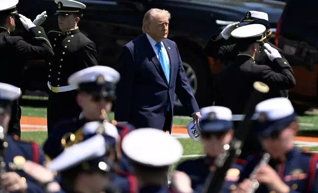 President Donald Trump arrives for the commencement address at the U.S. Coast Guard Academy in New London, Conn., Wednesday, May 20, 2026. (AP Photo/Jessica Hill)