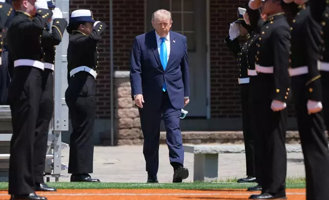 President Donald Trump arrives for the commencement address at the U.S. Coast Guard Academy, in New London, Conn., Wednesday, May 20, 2026. (AP Photo/Jacquelyn Martin)
